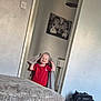 Carson joined the competition — help win amazing prizes! child, toddler, blanket, red_shirt, smiling, indoor, living_room, ottoman, bag, wall_art, doorway, carpet, happy, portrait, furniture, home, person, light, cozy, cute