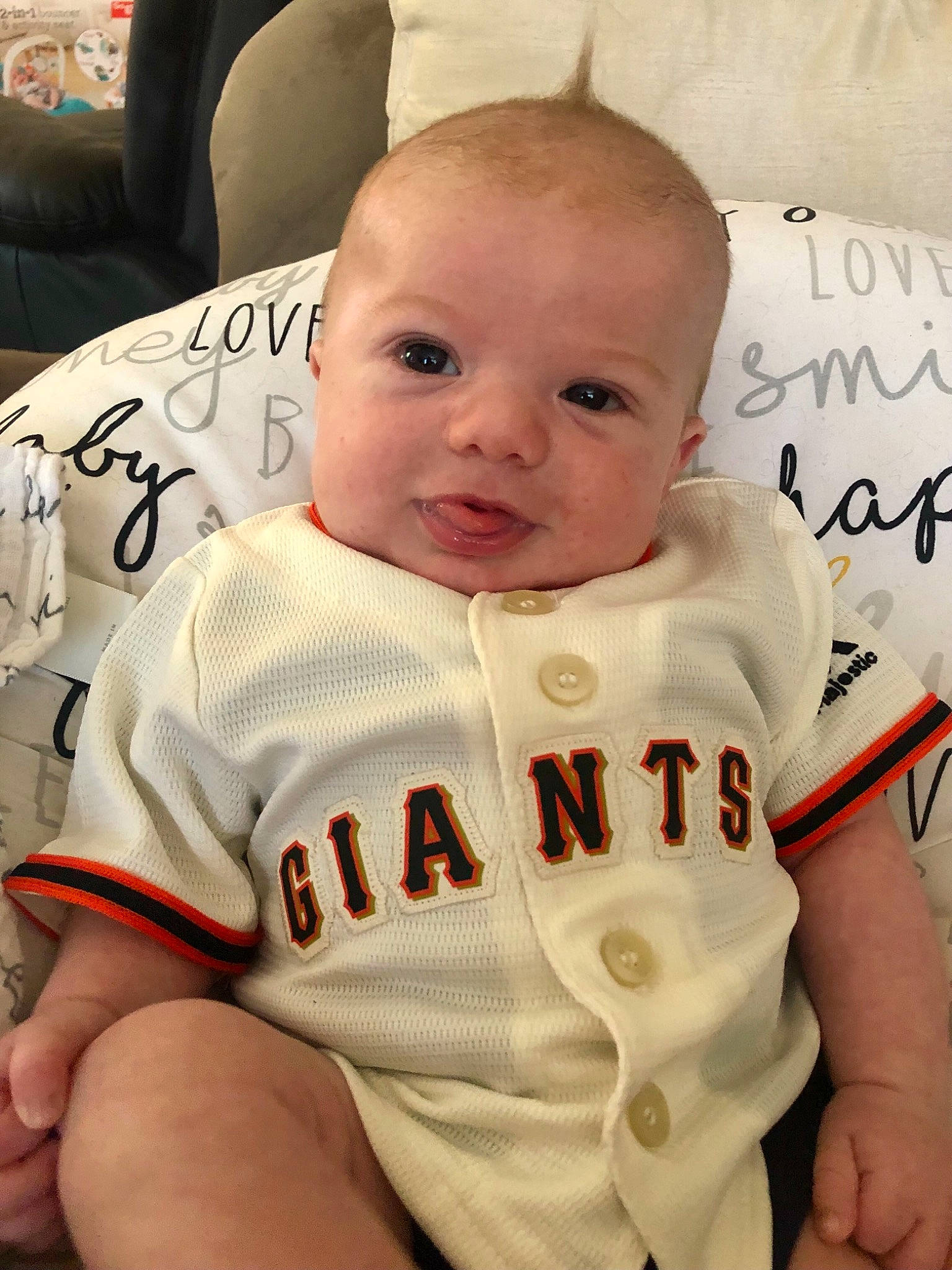 Orin joined the competition — help win amazing prizes! baby_toddler_clothing, cheek, comfort, eyebrow, face, finger, happy, head, jersey, joint, mammal, mouth, neck, orange, person, skin, sleeve, sports_jersey, sports_uniform, t_shirt