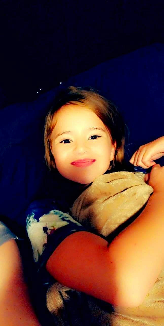 Isabella is registered to the contest to win money with this photo: arm, cheek, chin, comfort, eye, face, flash_photography, gesture, hair, hand, happy, human_body, joy, lip, mouth, muscle, neck, person, shoulder, skin