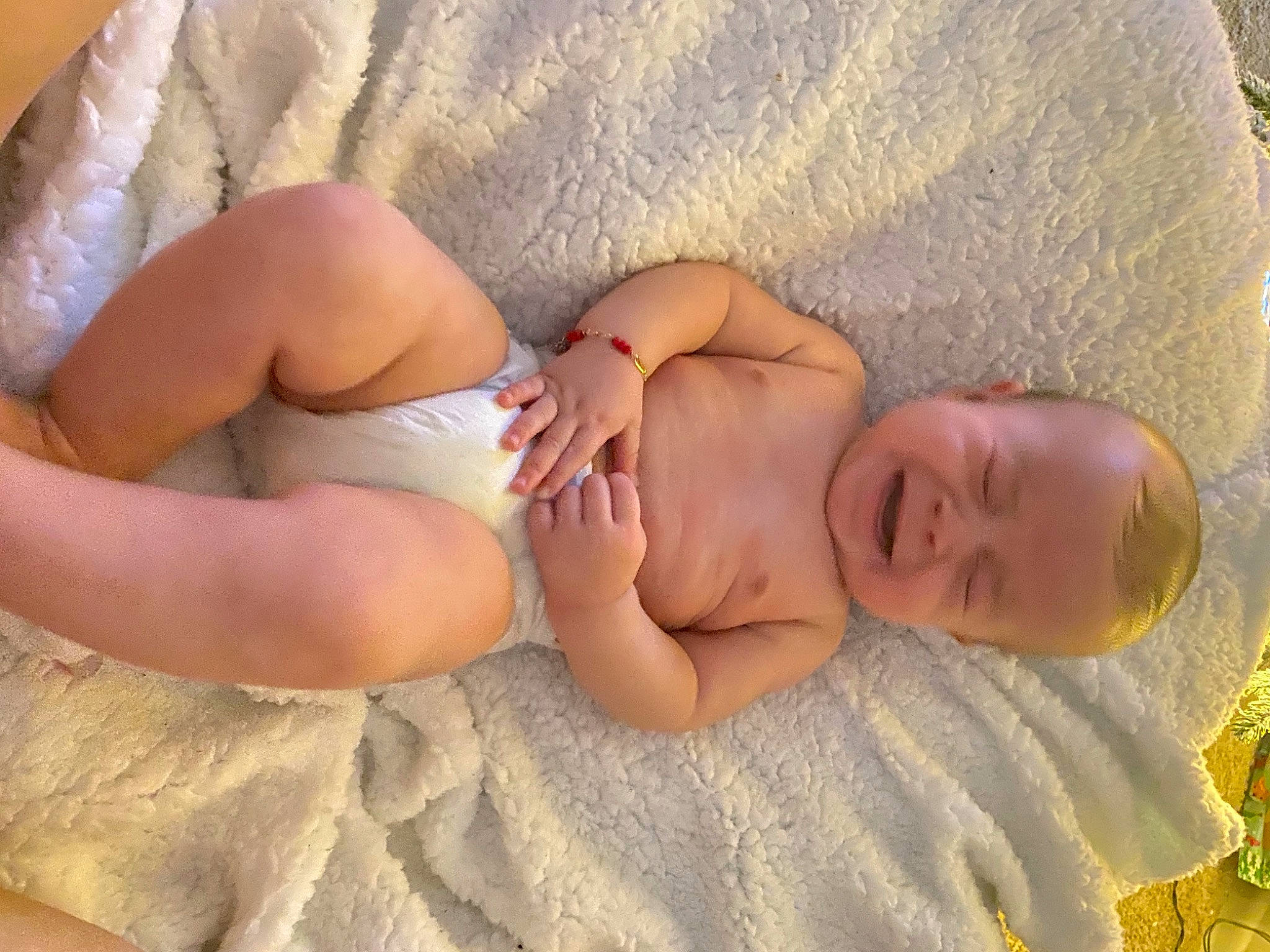 Daniel is registered to the contest to win money with this photo: abdomen, baby, baby_toddler_clothing, chest, child, comfort, diaper, finger, head, human_body, human_leg, linens, navel, person, skin, stomach, thigh, toddler, trunk, undergarment