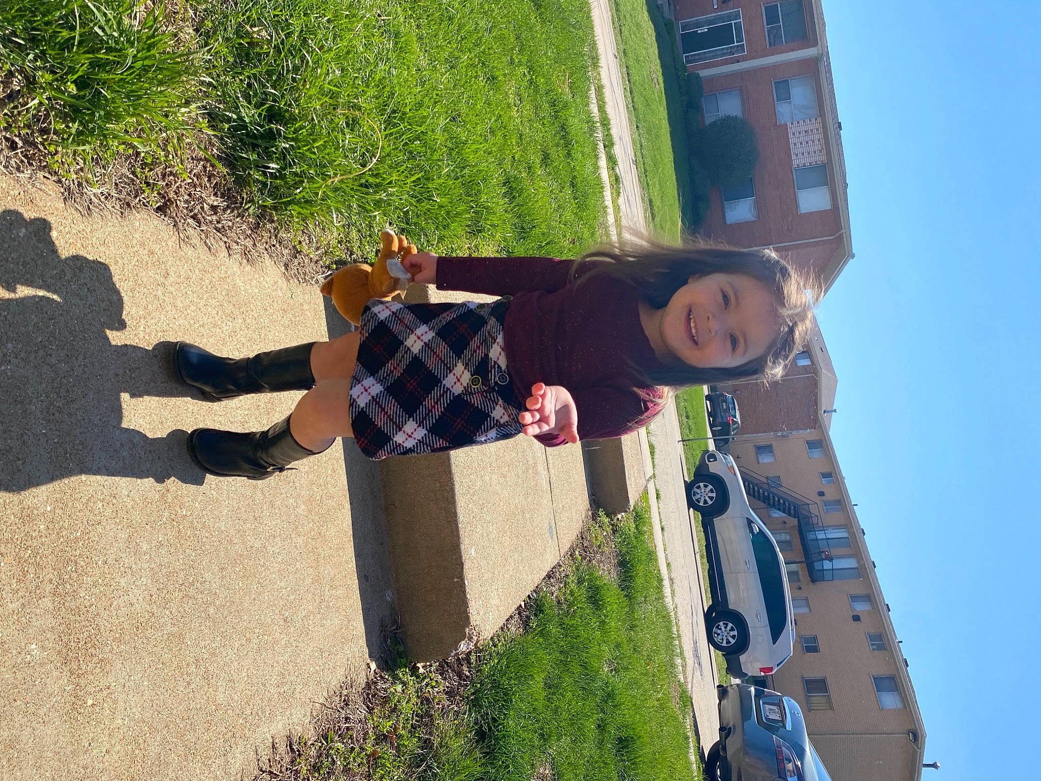 Alison is registered to the contest to win money with this photo: blue, building, car, facade, fun, grass, green, house, human_settlement, joy, landscape, leisure, people_in_nature, person, plant, shadow, sky, tints_and_shades, travel, tree