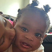 Kayden joined the competition — help win amazing prizes! toddler, child, baby, person, face, smile, hair, puffs, kiss, affection, love, indoor, window, light, adult, close_up, skin, expression, cute, happy