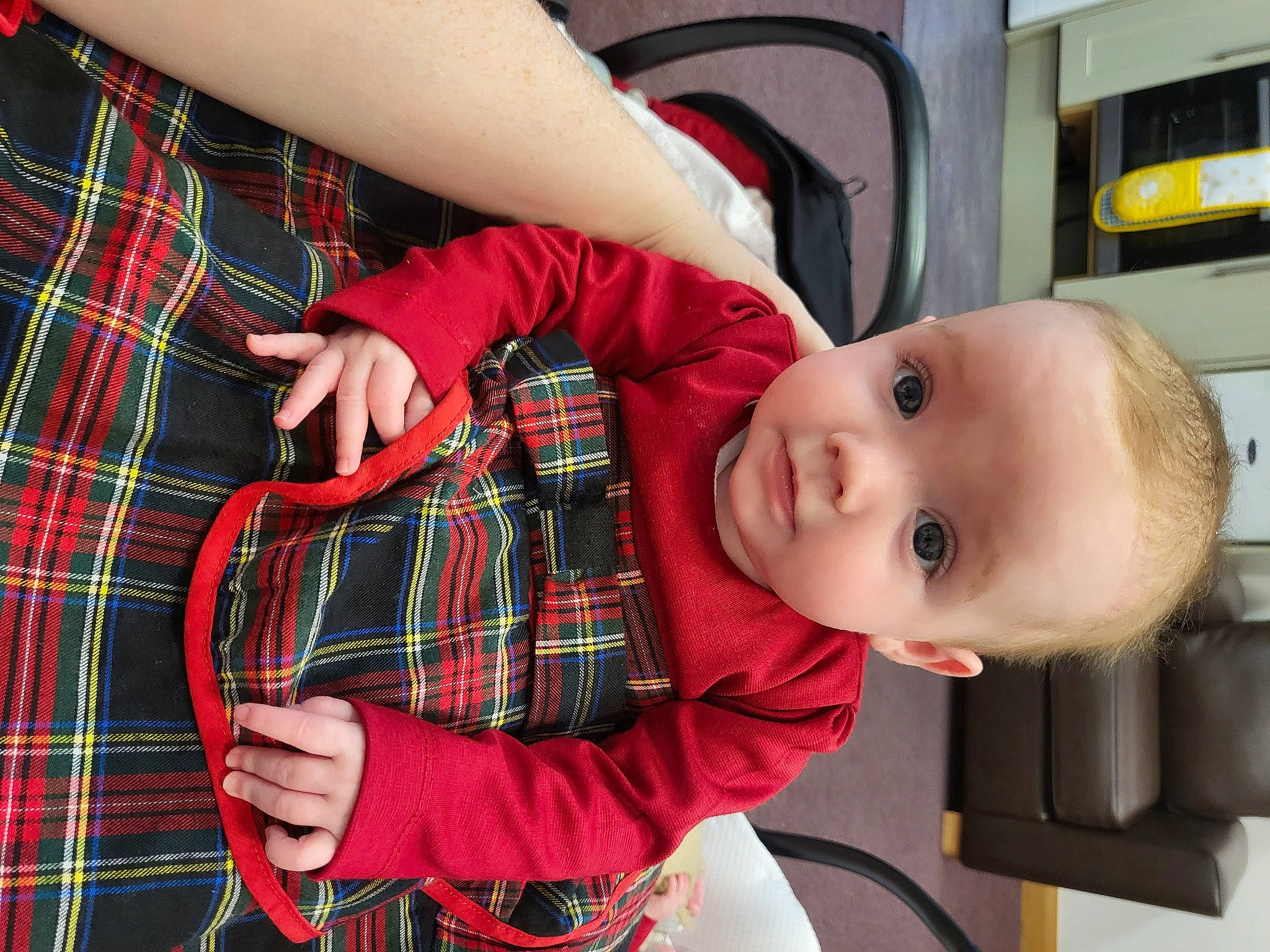 Aurora is registered to the contest to win money with this photo: automotive_exterior, baby, baby_products, baby_toddler_clothing, child, collar, comfort, fur, home_appliance, linens, pattern, person, plaid, room, sitting, sleeve, tartan, toddler, waist
