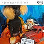 Blinkey is registered to the contest to win money with this photo: animal, black_dog, blue_backdrop, costume, cute, dog, festive, fluffy_ears, fluffy_paws, halloween, holiday, indoor, orange_decorations, pet, pumpkin, scarecrow, sitting, small_dog, stuffed_doll, toy_truck