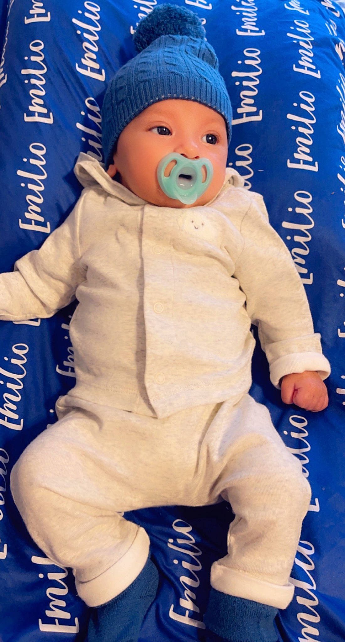 Emilio joined the competition — help win amazing prizes! baby, baby_toddler_clothing, blue, child, electric_blue, fun, gesture, glove, happy, hat, head, headwear, human_body, person, personal_protective_equipment, safety_glove, service, sleeve, sports_gear, textile