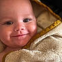 baby, smiling, face, closeup, towel, blanket, soft_texture, wrapped, infant, cute, skin, eyes, indoors, warm, comfort, child, happy, portrait, newborn, head