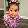 Aria joined the competition — help win amazing prizes! child, pajamas, tiara, indoor, curious, smile, face, person, young_child, cartoon_character, colorful_clothing, hair, floor, bookshelf, wooden_floor, mischievous, cute, portrait, head, eyes
