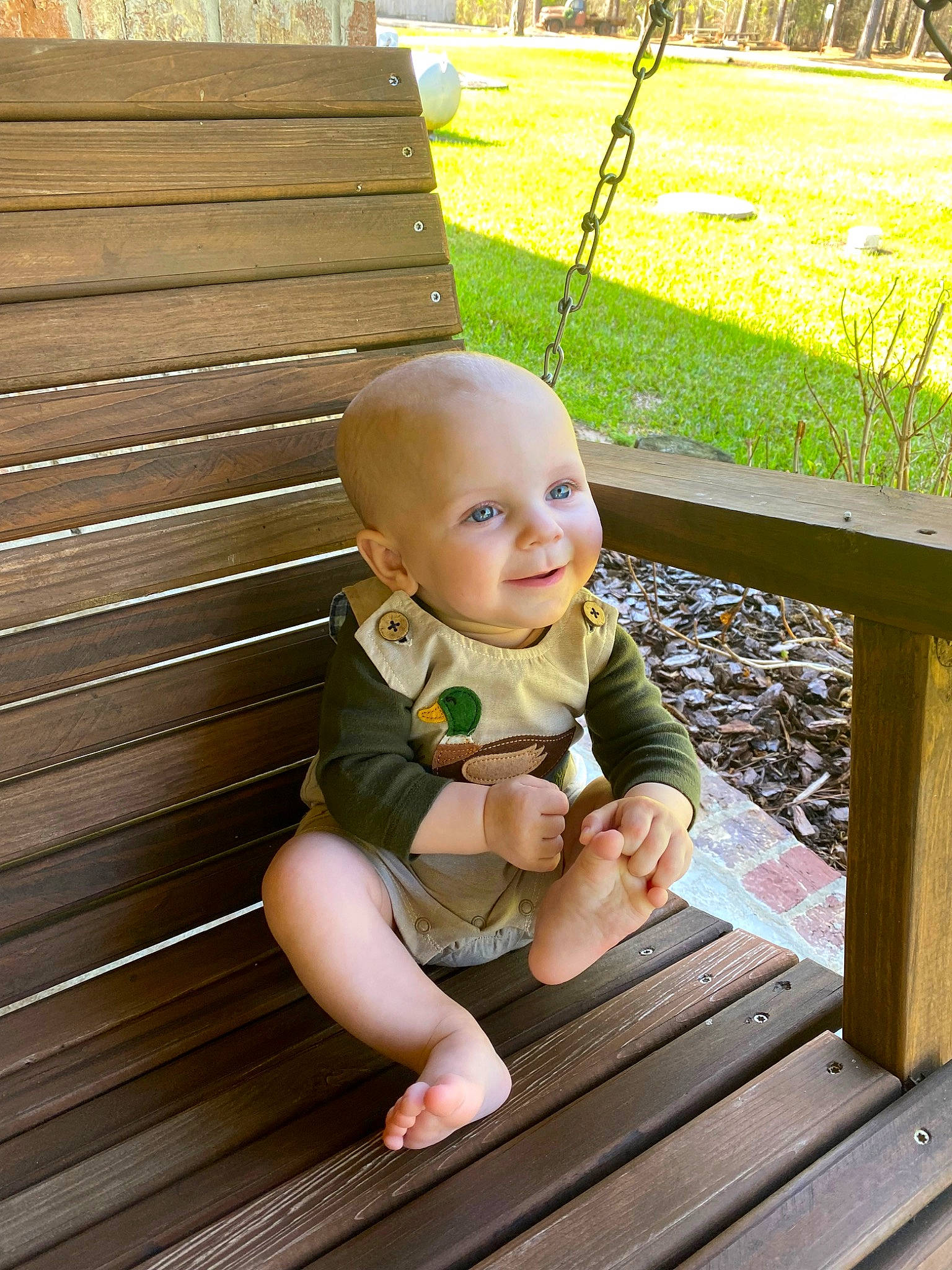 Daxton joined the competition — help win amazing prizes! baby, baby_toddler_clothing, child, flooring, grass, green, hardwood, leaf, leisure, mammal, outdoor_bench, outdoor_furniture, people_in_nature, person, plant, product, skin, smile, toddler, vertebrate
