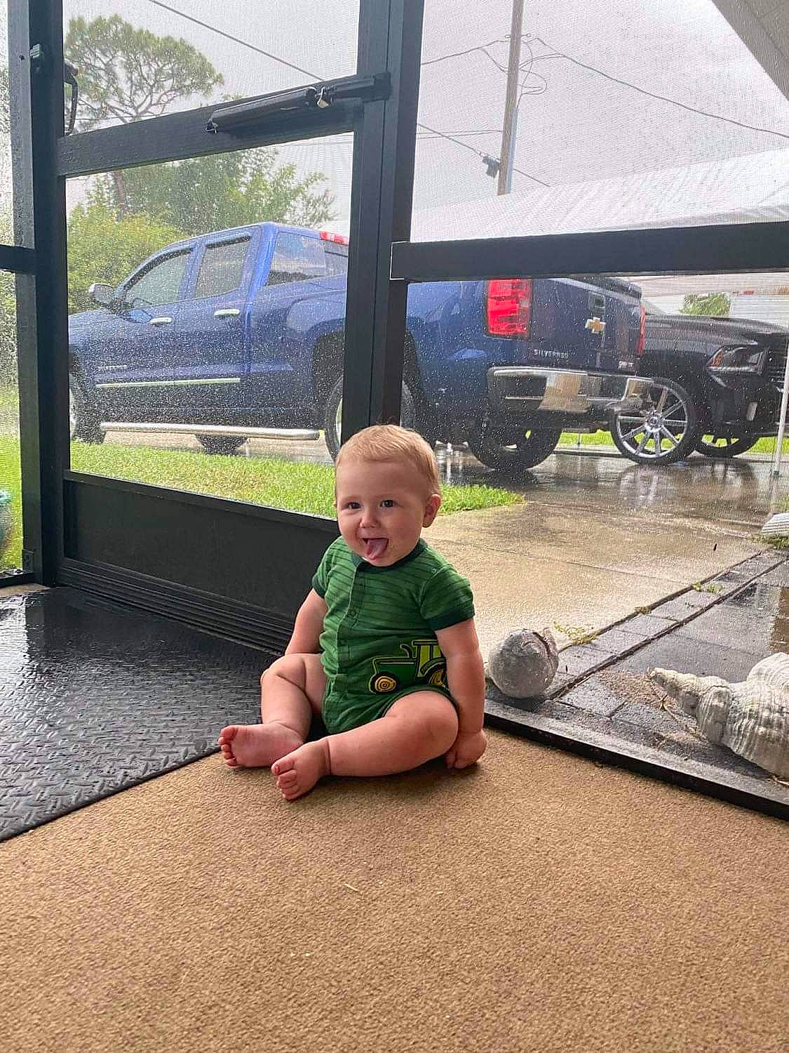 Kelvin joined the competition — help win amazing prizes! baby, car, child, fun, glass, person, plant, play, recreation, sitting, summer, toddler, vacation, vehicle, window