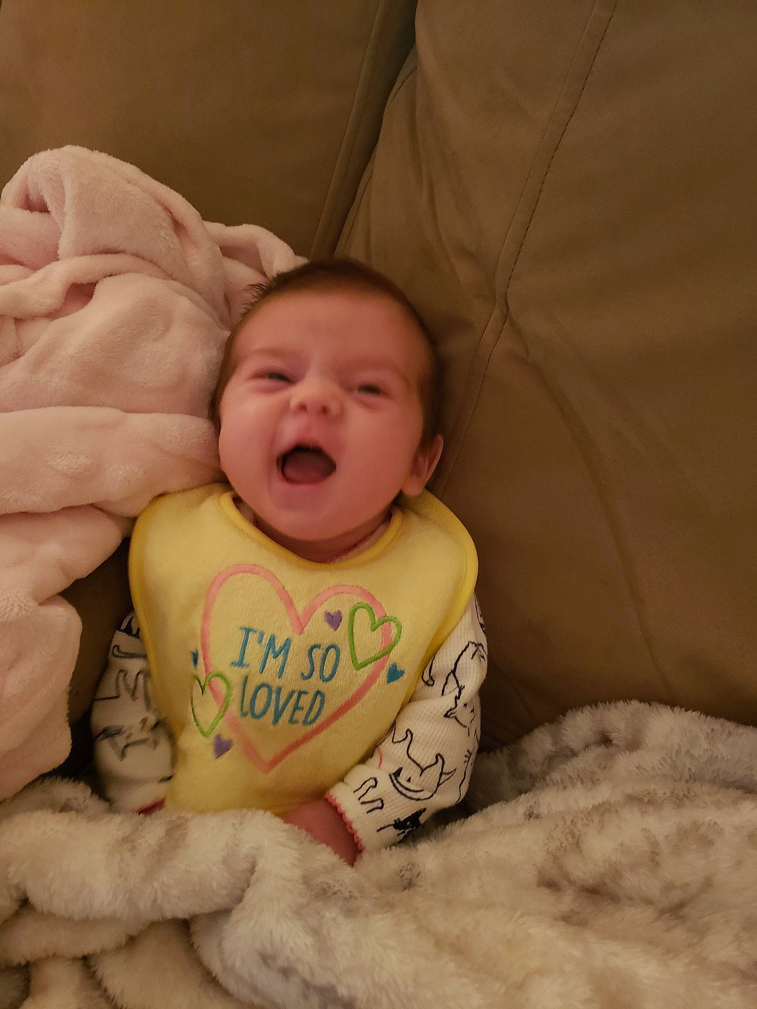 Emelia is registered to the contest to win money with this photo: baby, bedtime, cheek, child, ear, eye, face, facial_expression, finger, hand, head, laugh, mouth, person, skin, smile, toddler