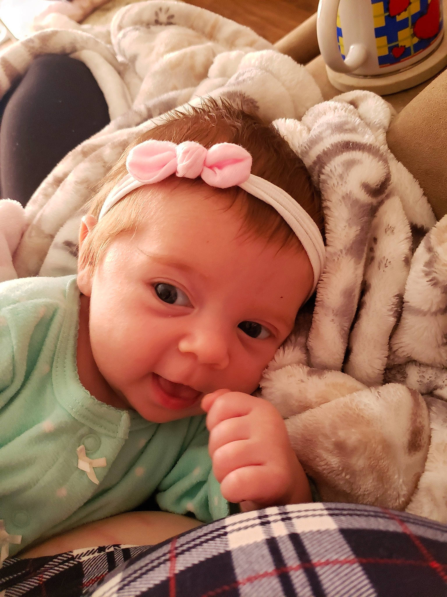 Emelia is registered to the contest to win money with this photo: baby, cheek, child, ear, eye, face, finger, hand, head, headgear, mouth, nose, person, skin, smile, thumb, toddler