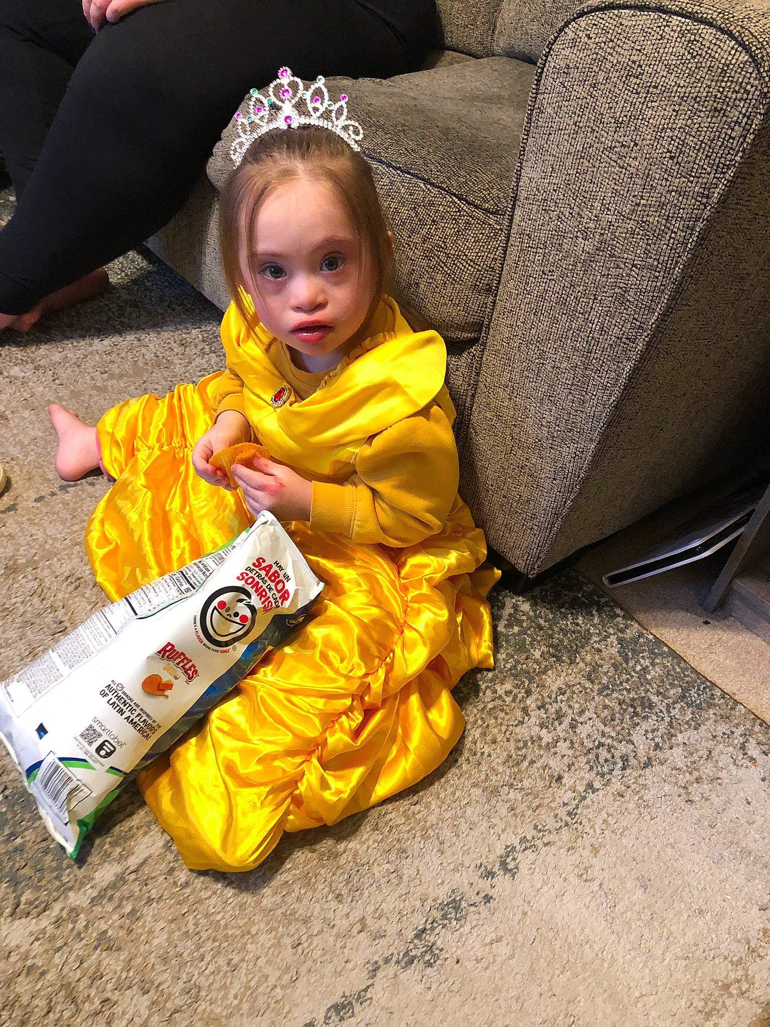 Frankie is registered to the contest to win money with this photo: asphalt, car_seat, child, comfort, couch, crown, event, fashion_accessory, flooring, fun, grass, happy, headpiece, jewellery, luxury_vehicle, person, road_surface, sitting, toddler, tradition