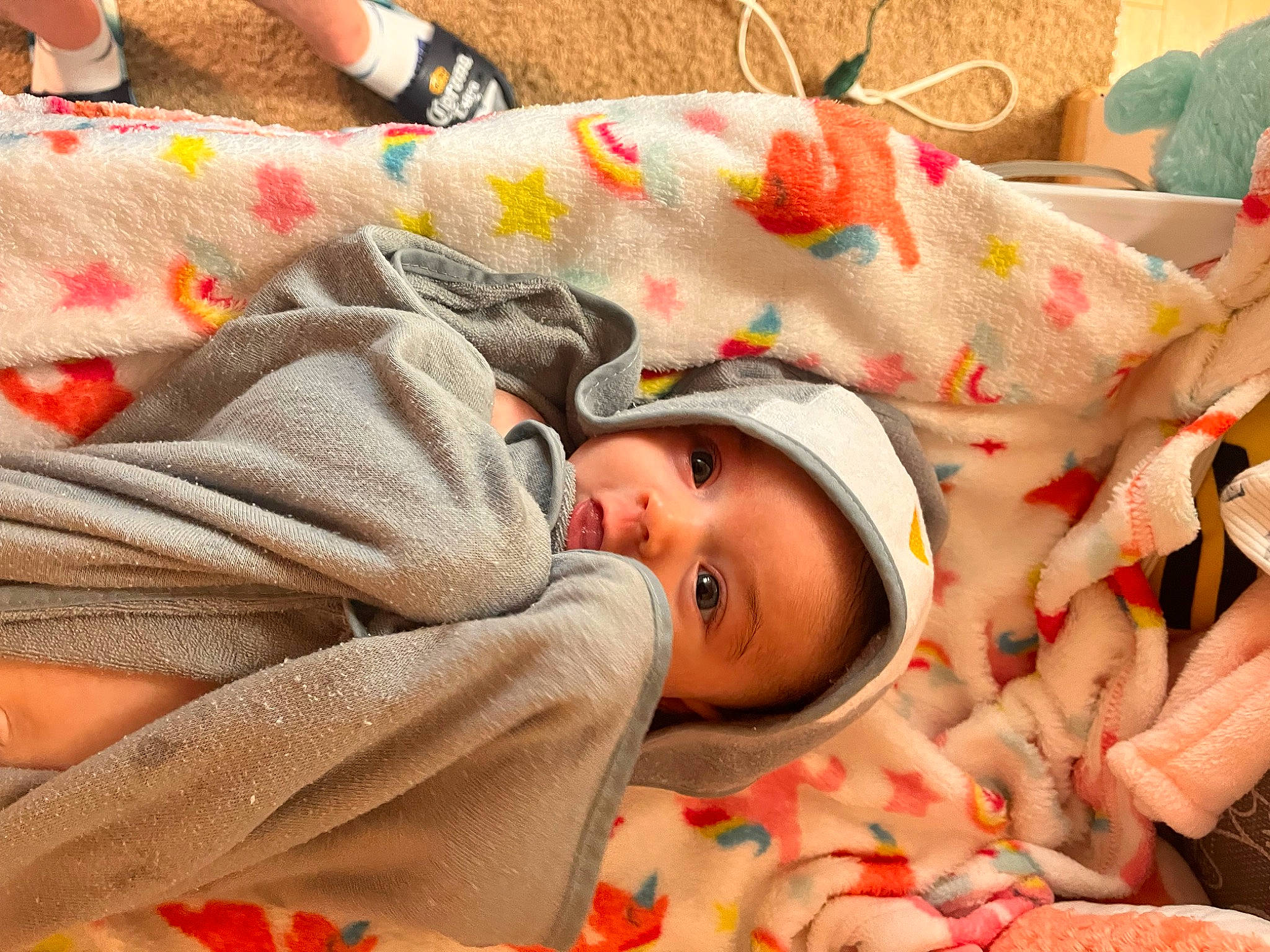 Tenley is registered to the contest to win money with this photo: baby, baby_products, baby_sleeping, baby_toddler_clothing, bedtime, carmine, cheek, comfort, eye, happy, hat, head, headwear, linens, orange, pattern, person, room, smile, textile