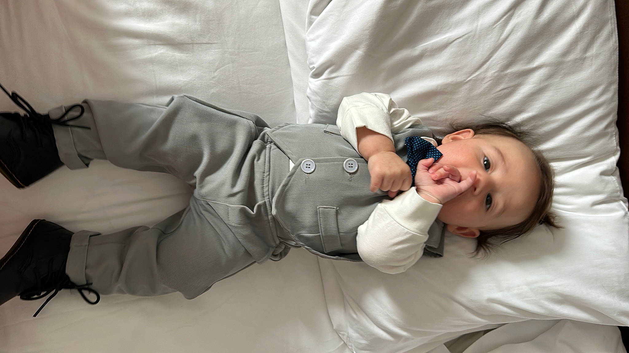 Edward is registered to the contest to win money with this photo: abdomen, baby, baby_products, baby_sleeping, baby_toddler_clothing, child, comfort, elbow, happy, human_leg, knee, linens, monochrome_photography, nap, person, sitting, sleep, sleeve, smile, sunglasses