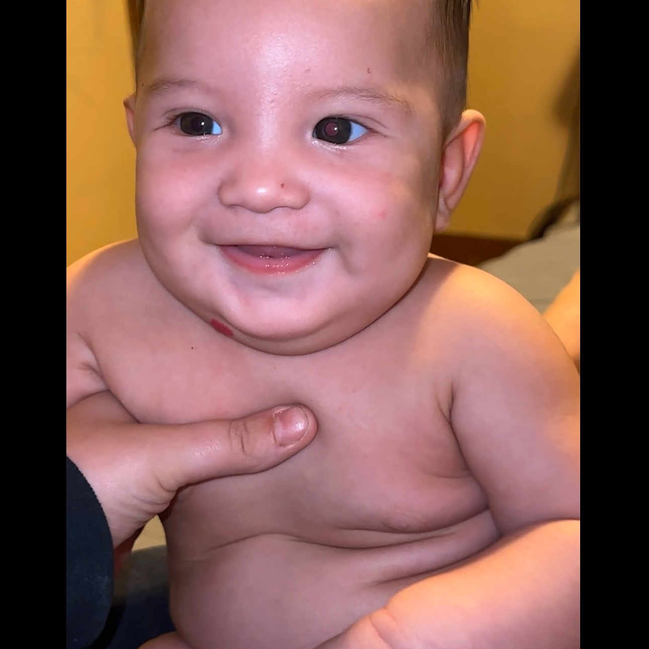 Ares is registered to the contest to win money with this photo: baby, babylaughing, bodypart, face, finger, hand, happy, head, laughing, person, photography, portrait, smile