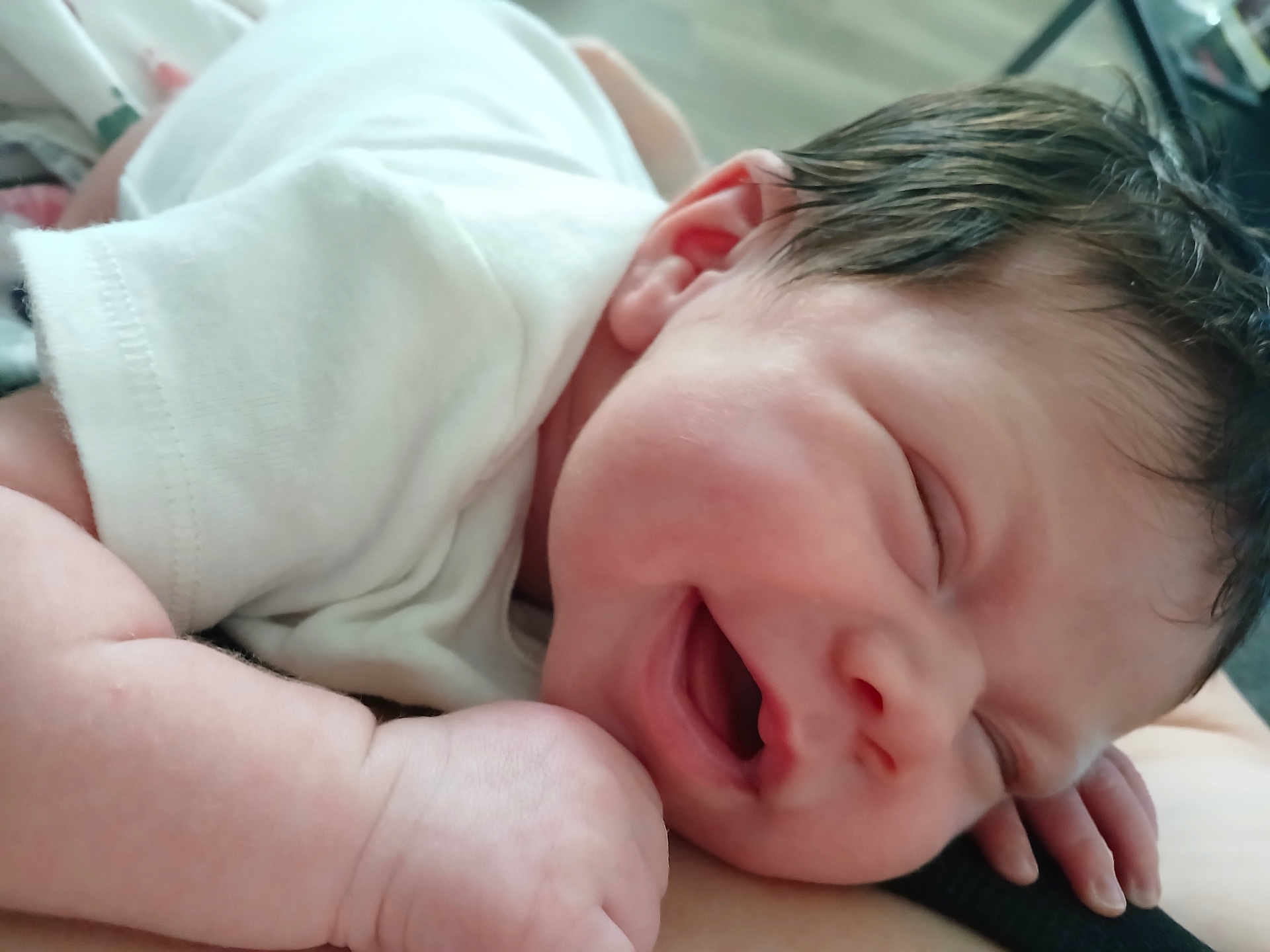 Amoura joined the competition — help win amazing prizes! baby, newborn, smiling, sleeping, infant, white_clothing, closeup, face, hand, skin, cute, adorable, peaceful, resting, human, child, lying_down, soft_light, portrait, indoor