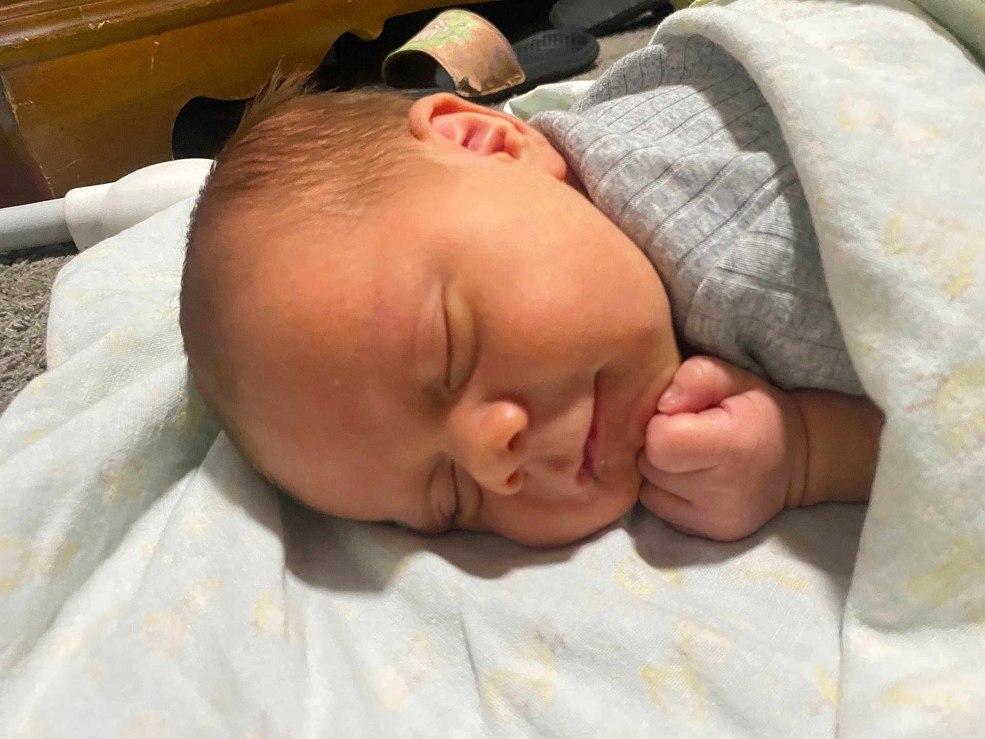 Jorah is registered to the contest to win money with this photo: baby, newborn, sleeping, blanket, infant, face, hand, cozy, resting, soft, cute, peaceful, child, toddler, indoors, closeup, skin, head, comfort, portrait