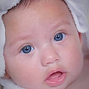 Chandra joined the competition — help win amazing prizes! baby, close_up, face, blue_eyes, skin, towel, cute, infant, portrait, child, expression, soft, newborn, head, adorable, gaze, pink_lips, healthy_skin, innocent, young