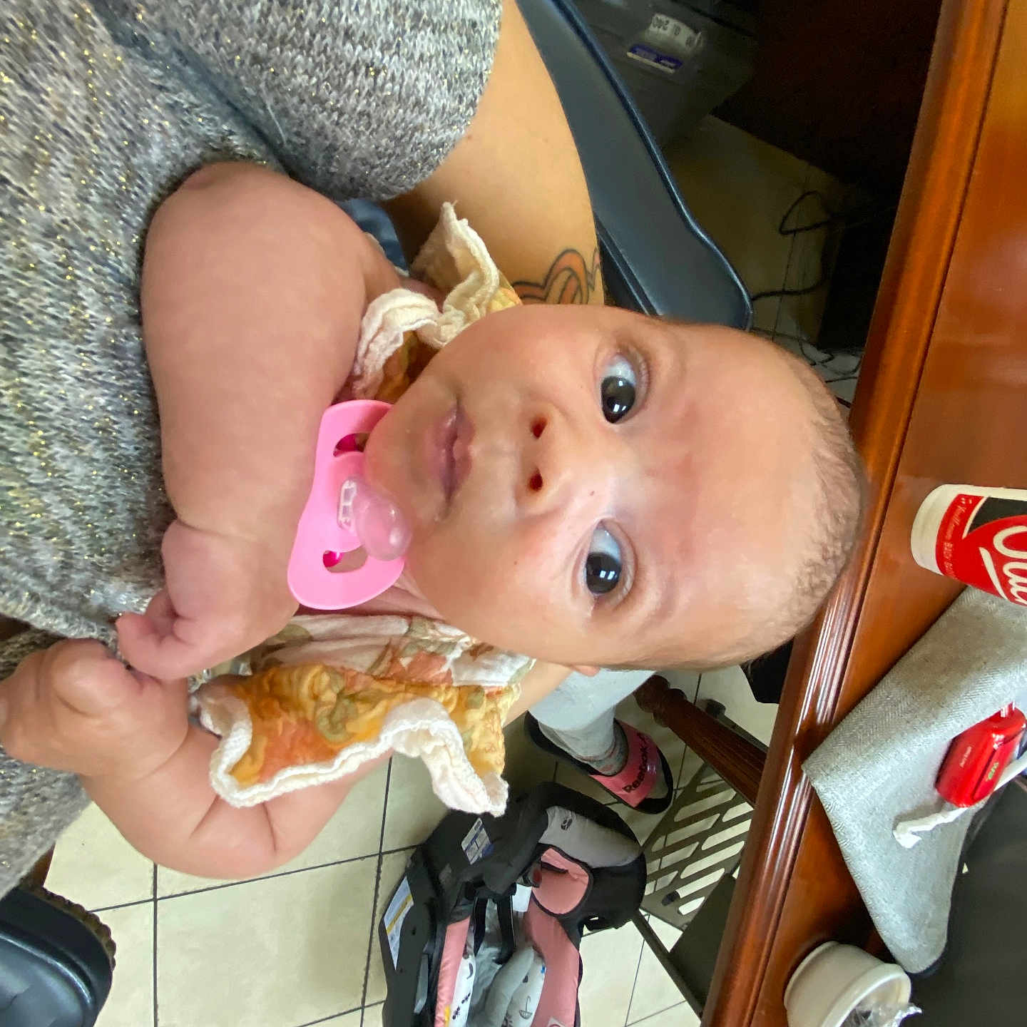 Khamiya joined the competition — help win amazing prizes! baby, infant, child, portrait, pacifier, wide_eyed, sitting, indoors, gray_sweater, floral_clothing, wooden_table, baby_bottle, baby_gear, stroller, tile_floor, furniture, home, close_up, looking_at_camera, safe