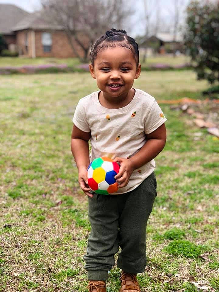Amiyah is registered to the contest to win money with this photo: ball, child, easter, fun, grass, grassland, happy, holiday, joy, meadow, people, person, plant, play, smile, toddler, vacation