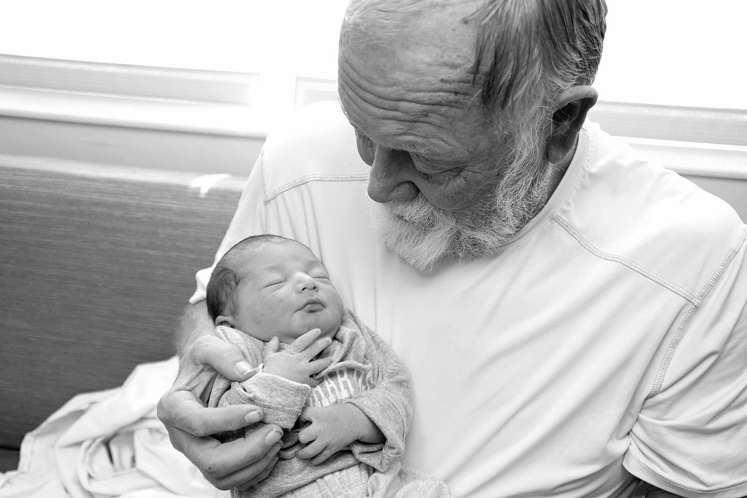 Kamren is registered to the contest to win money with this photo: baby, birth, black_and_white, child, grandparent, monochrome, monochrome_photography, person, photograph, photography, stock_photography, style