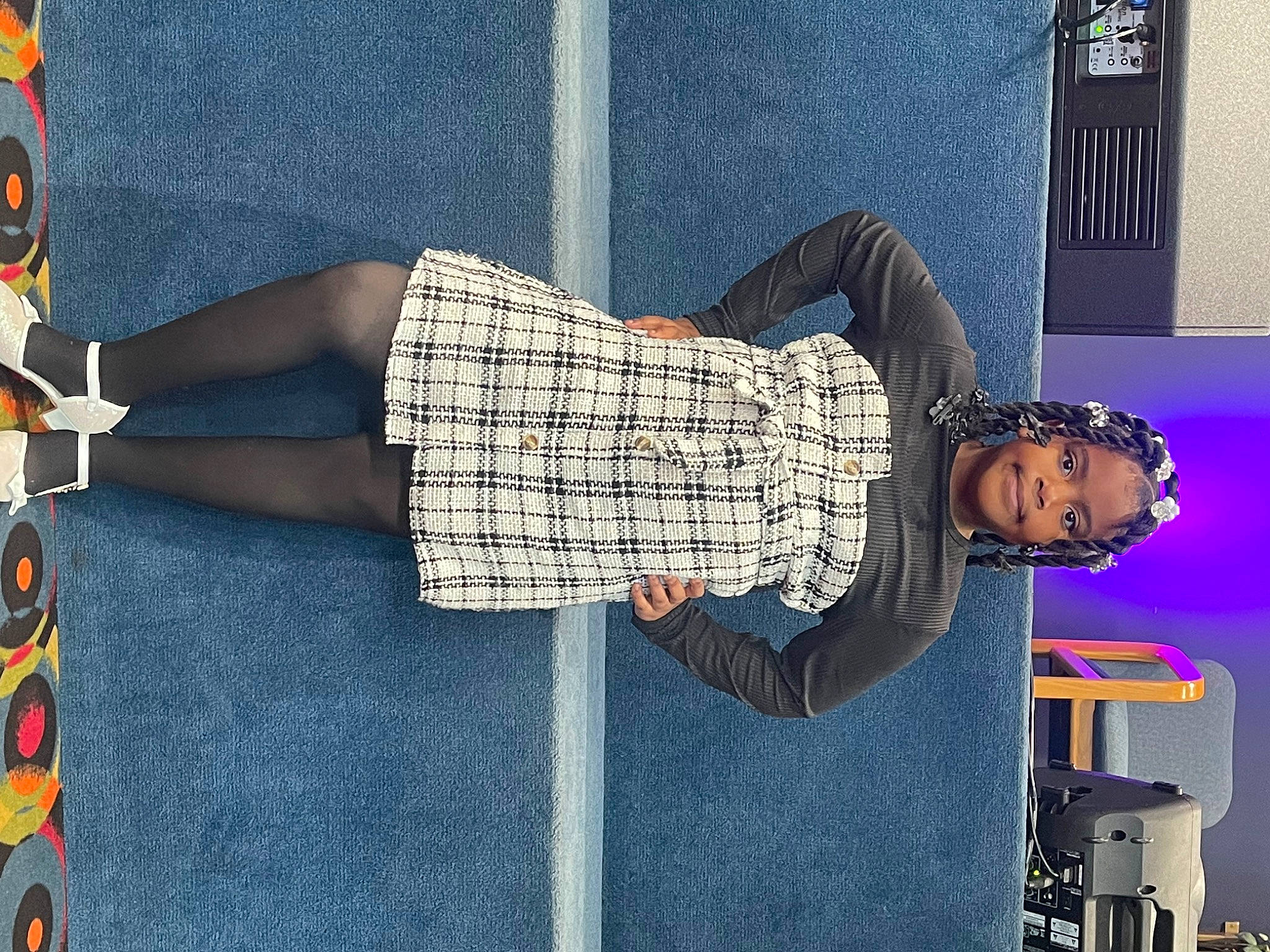 Faith is registered to the contest to win money with this photo: arm, art, denim, elbow, electric_blue, fashion, hand, human_leg, joint, knee, pattern, person, plaid, shoulder, sleeve, sportswear, t_shirt, tartan, textile, thigh