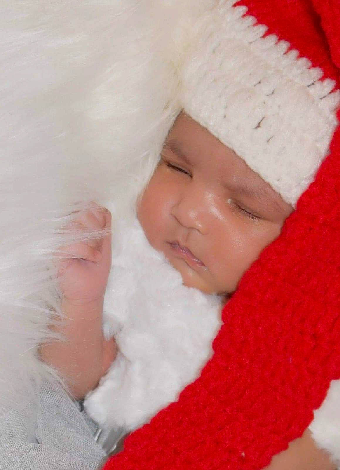 Celina is registered to the contest to win money with this photo: cheek, child, fur, girl, headgear, infant, knitting, lip, material, person, product, skin, textile, toddler, wool