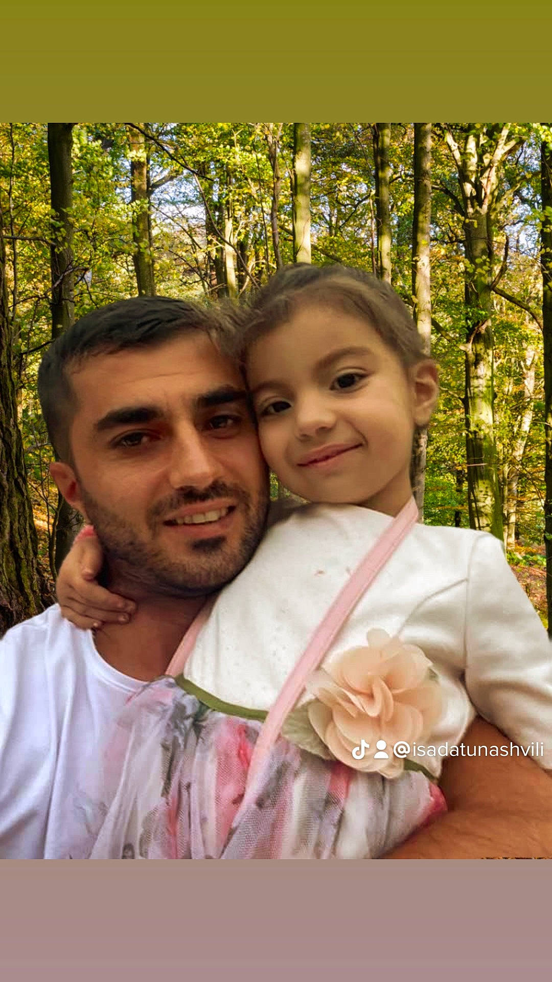 Lela is registered to the contest to win money with this photo: beard, botany, child, event, flower, formal_wear, fun, gesture, grass, happy, joy, leisure, love, people_in_nature, person, petal, plant, rose, smile, spring