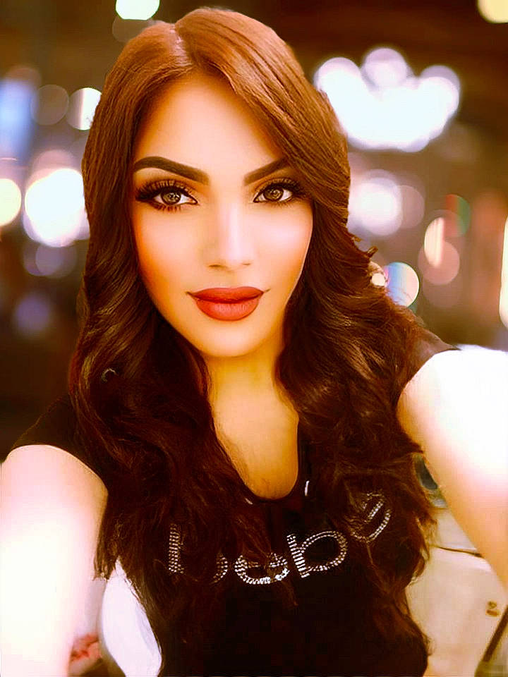 Lela is registered to the contest to win money with this photo: amber, black_hair, eye, eye_liner, eye_shadow, eyebrow, eyelash, fashion, fashion_model, flash_photography, gesture, hairstyle, layered_hair, lip, lipstick, makeover, orange, person, skin, smile