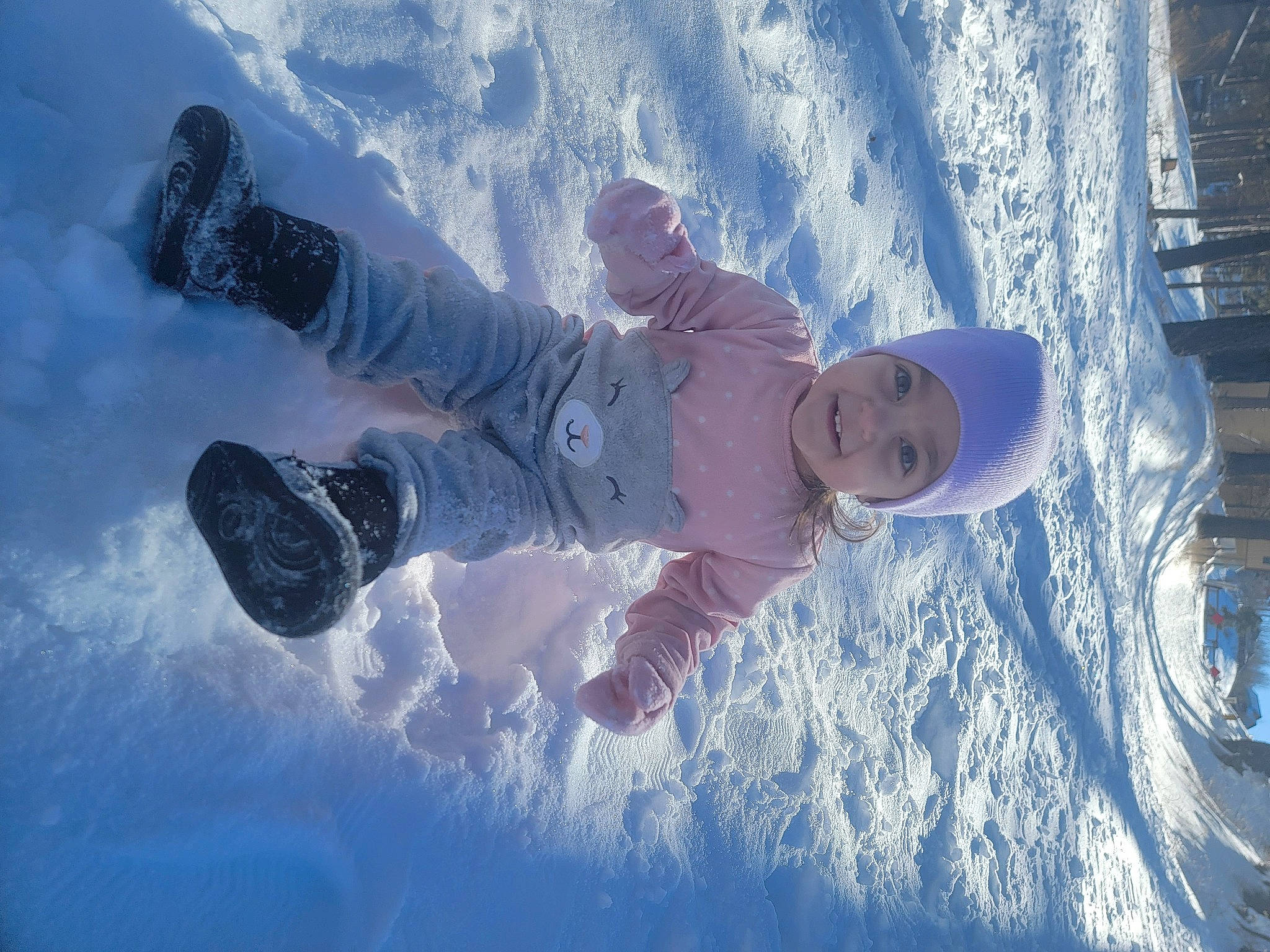 Madison is registered to the contest to win money with this photo: electric_blue, freezing, frost, fun, geological_phenomenon, glacial_landform, glove, happy, headwear, ice_cap, joy, leisure, mountain_range, mountainous_landforms, person, recreation, sky, slope, smile, snow