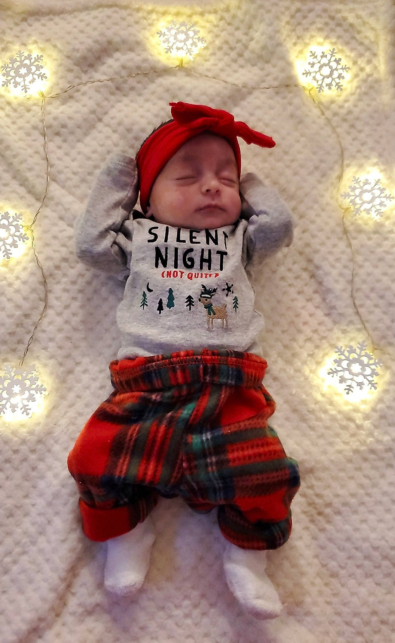 Madison is registered to the contest to win money with this photo: baby, baby_products, baby_toddler_clothing, beanie, bonnet, cheek, child, costume_accessory, headwear, hood, nose, pattern, person, sleeve, sock, textile, toddler