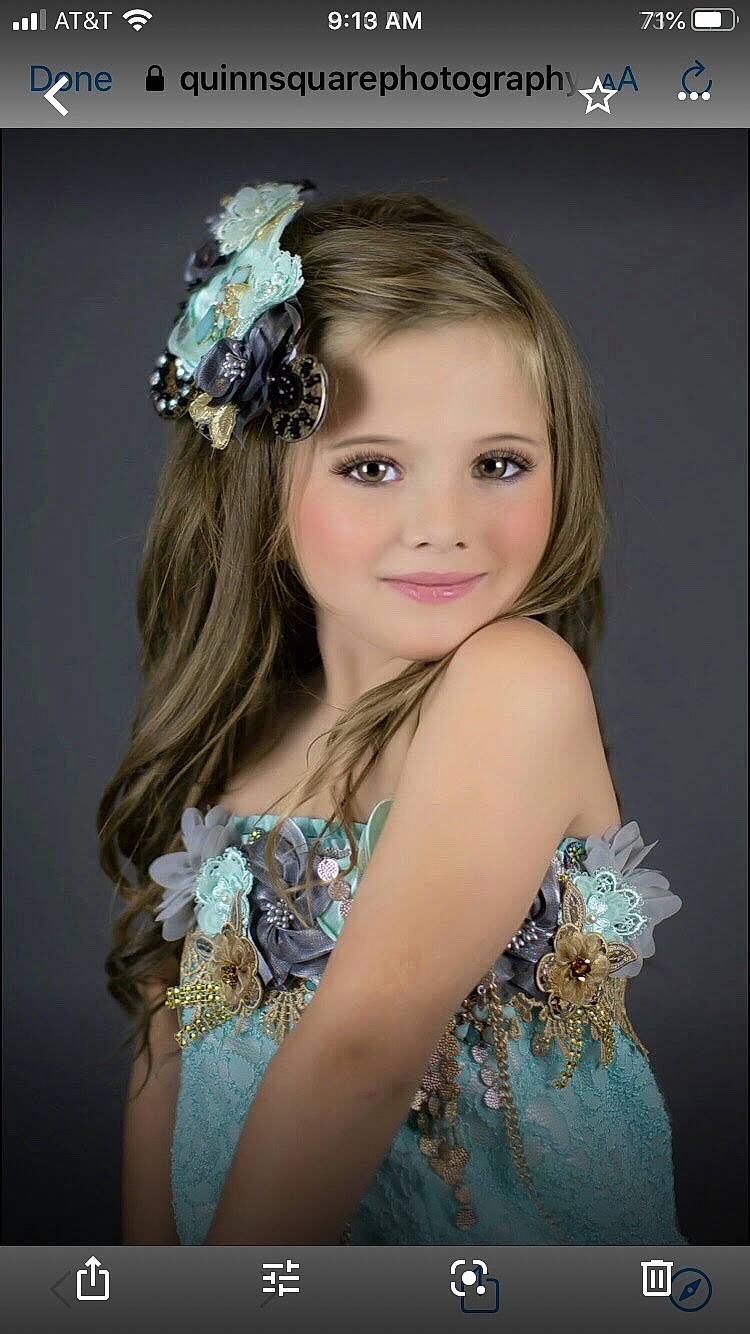 Jojo is registered to the contest to win money with this photo: beauty, brown_hair, child, child_model, dress, fashion_accessory, flower_girl, hair, hair_accessory, hairstyle, headgear, headpiece, joy, long_hair, person, photo_shoot, photography, portrait