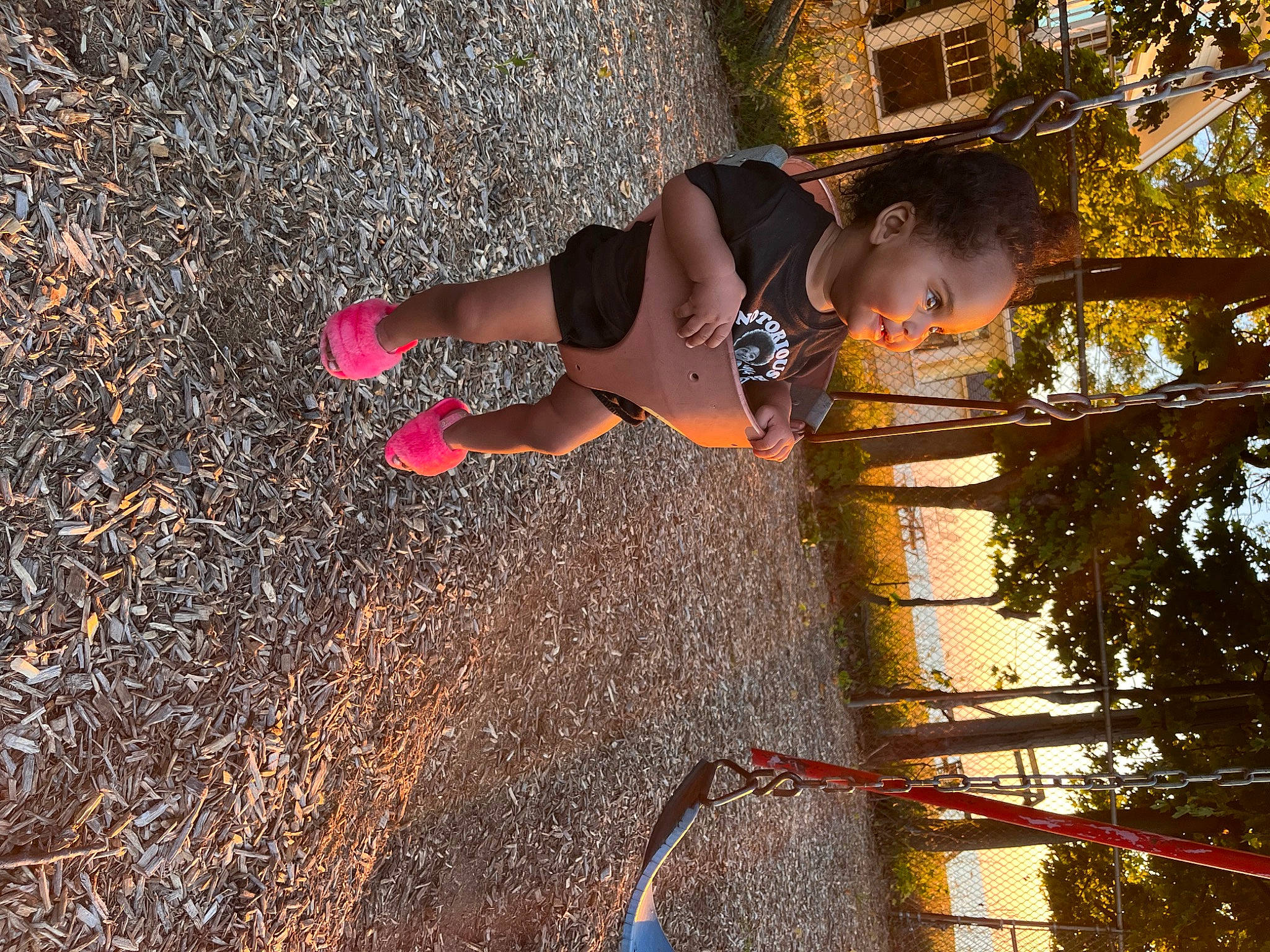 Liberty is registered to the contest to win money with this photo: asphalt, fun, grass, happy, human_leg, leaf, leisure, people_in_nature, person, plant, recreation, shadow, soil, spring, sunlight, thigh, tints_and_shades, toddler, tree, twig