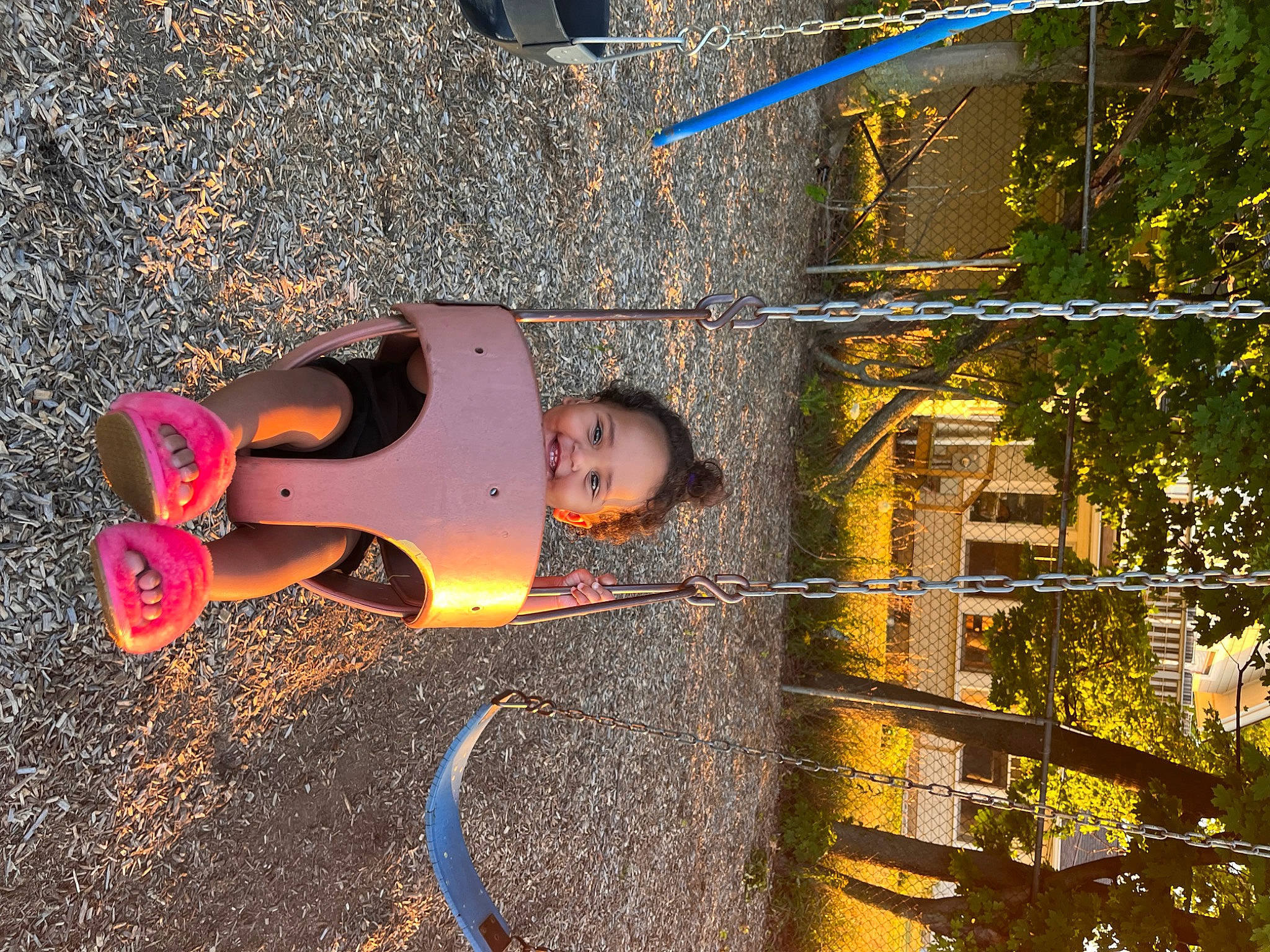 Liberty is registered to the contest to win money with this photo: asphalt, city, fun, grass, human_leg, joy, leisure, people_in_nature, person, plant, reflection, road_surface, sandal, shadow, sidewalk, soil, street_light, sunlight, thigh, tints_and_shades