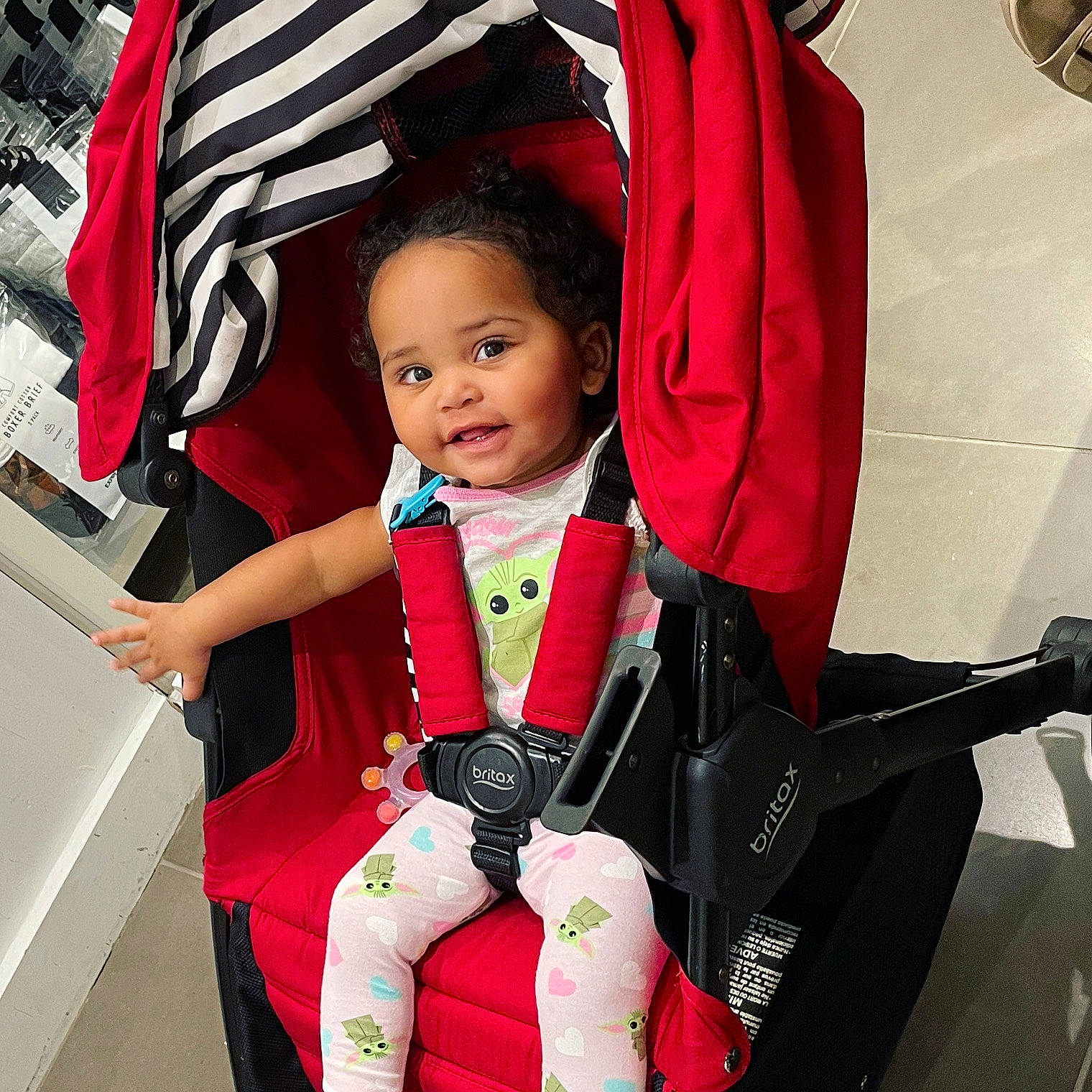 Liberty joined the competition — help win amazing prizes! baby, baby_carriage, baby_products, baby_toddler_clothing, child, cool, facial_expression, fashion, fashion_accessory, fun, happy, magenta, person, pink, product, red, service, sleeve, smile, toddler