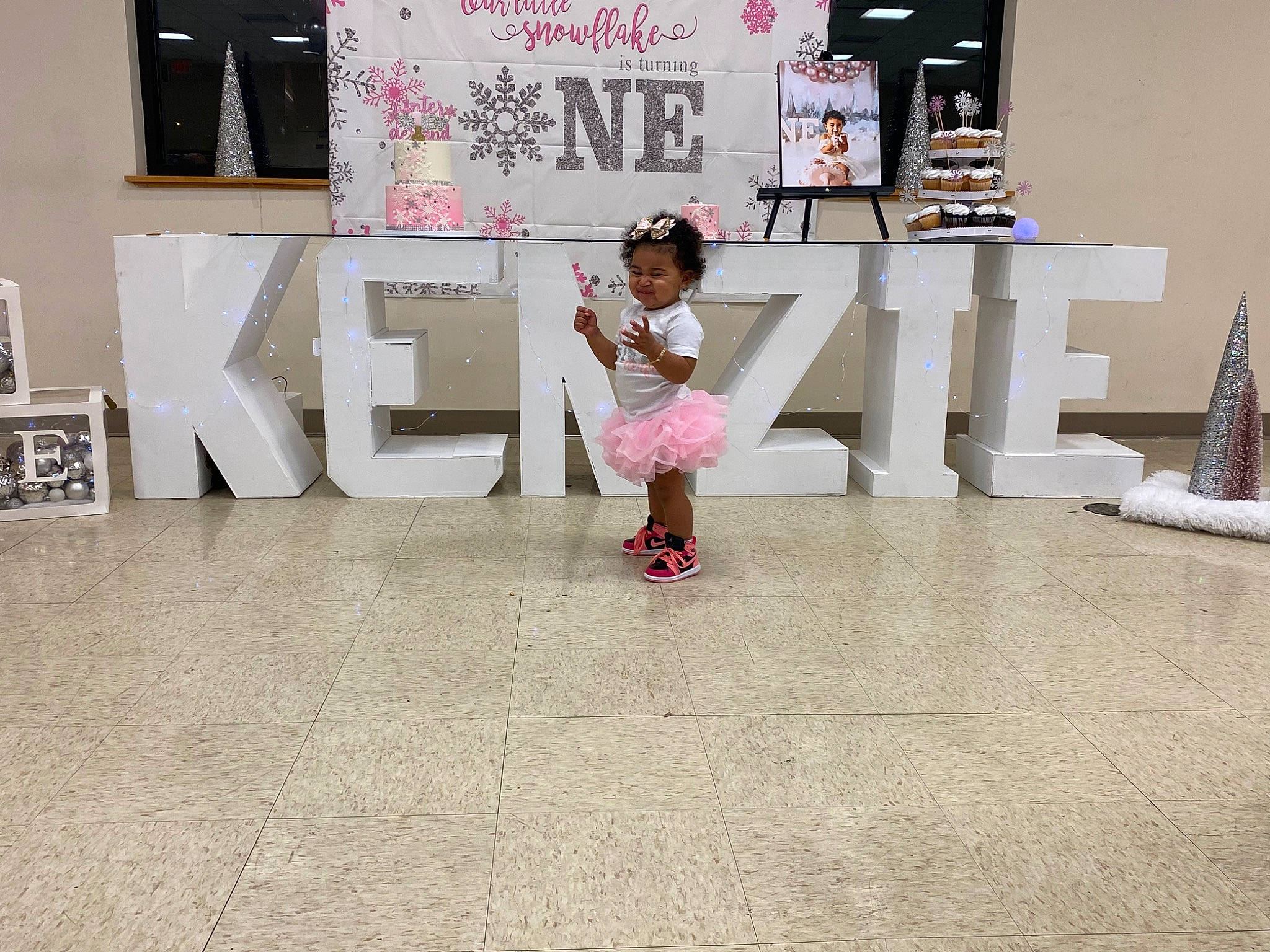 Mackenzie is registered to the contest to win money with this photo: art, building, carpet, child, fashion_design, floor, flooring, font, fun, hardwood, magenta, person, room, toddler, visual_arts, wall, wood