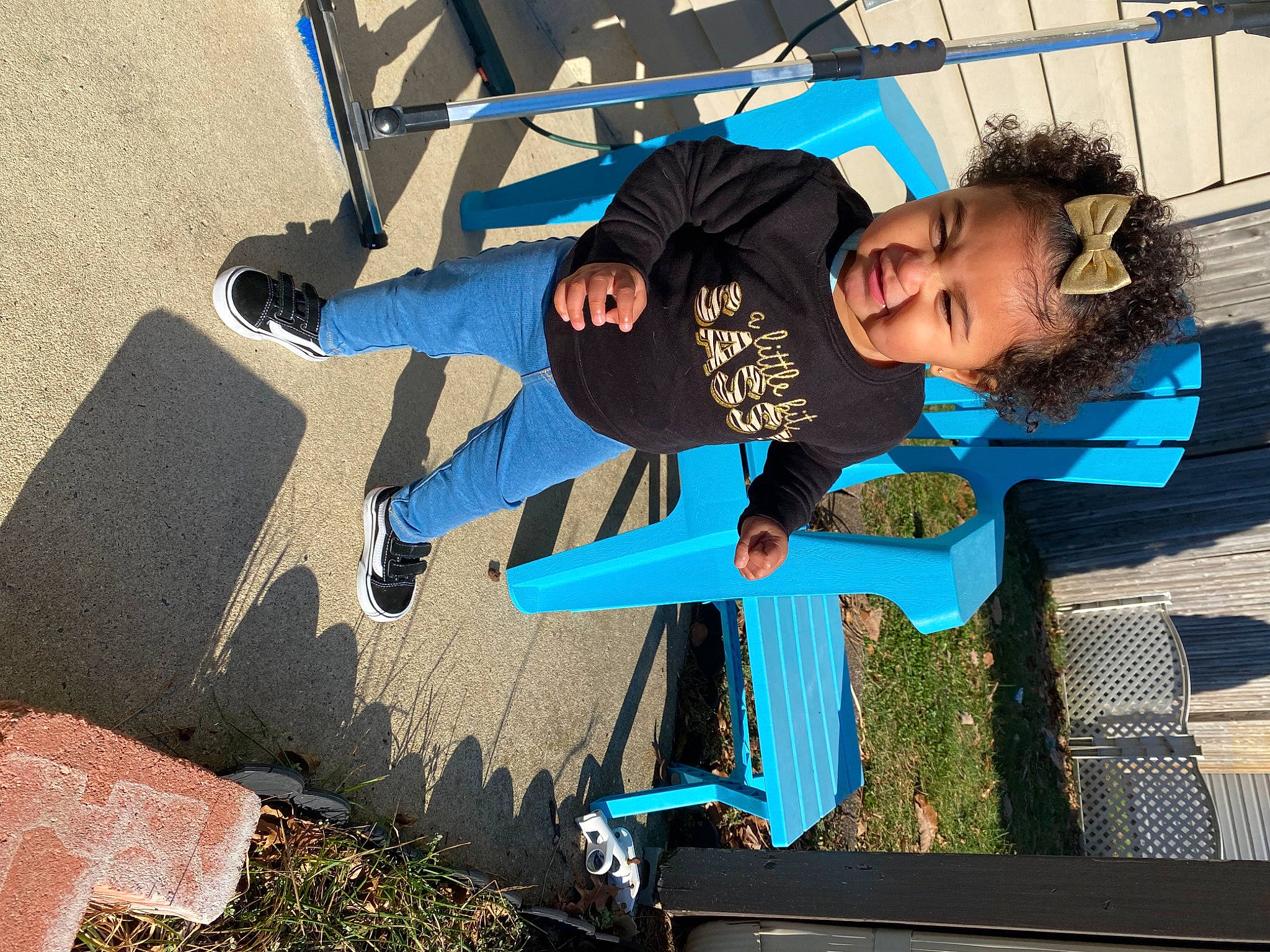 Mackenzie is registered to the contest to win money with this photo: asphalt, concrete, cool, design, electric_blue, fun, grass, hat, leisure, people, person, public_space, recreation, shadow, soil, t_shirt, walking_shoe, wood, world