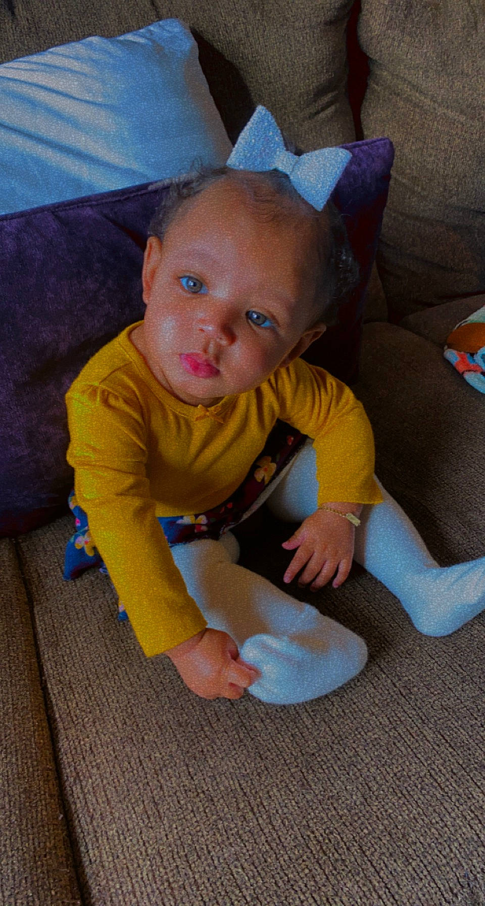 Tanji is registered to the contest to win money with this photo: ankle, baby, baby_crawling, baby_toddler_clothing, barefoot, child, crawling, flooring, foot, human_body, mouth, nose, person, play, sock, toddler, toy, tummy_time