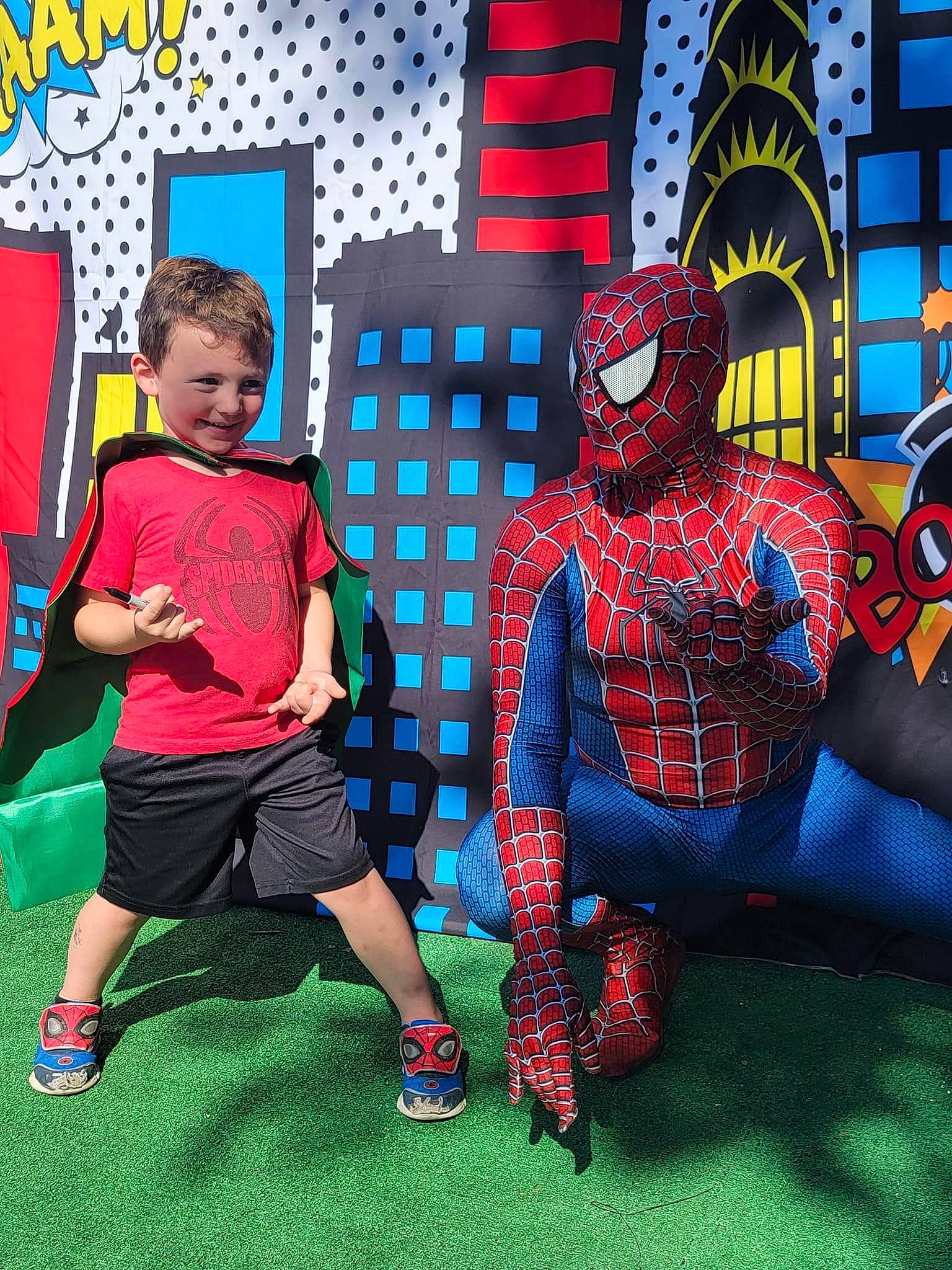 Jason is registered to the contest to win money with this photo: art, avengers, azure, carmine, cool, electric_blue, fictional_character, fun, games, grass, joy, leisure, magenta, pattern, person, recreation, shorts, spider_man, t_shirt, toddler