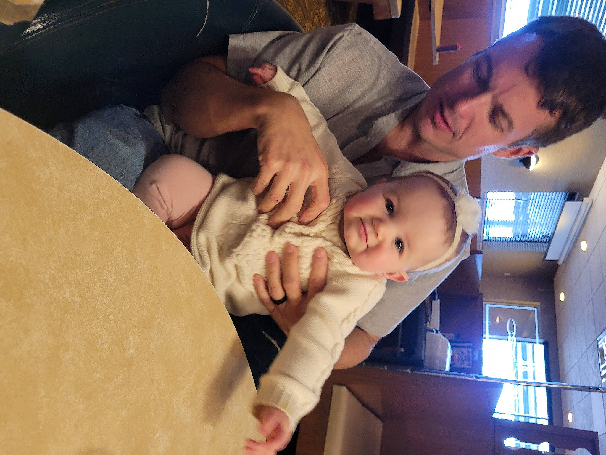 Makenzie is registered to the contest to win money with this photo: abdomen, baby, baby_products, car_seat, cheek, child, comfort, event, finger, fun, gesture, happy, mouth, nose, person, room, sitting, toddler, tree, vacation