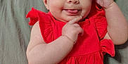 Brylee Grace is registered to the contest to win money with this photo: baby, bodypart, cap, clothing, costume, dress, face, finger, hand, happy, hat, head, homedecor, indoors, newborn, person, photography, portrait, sitting, smile