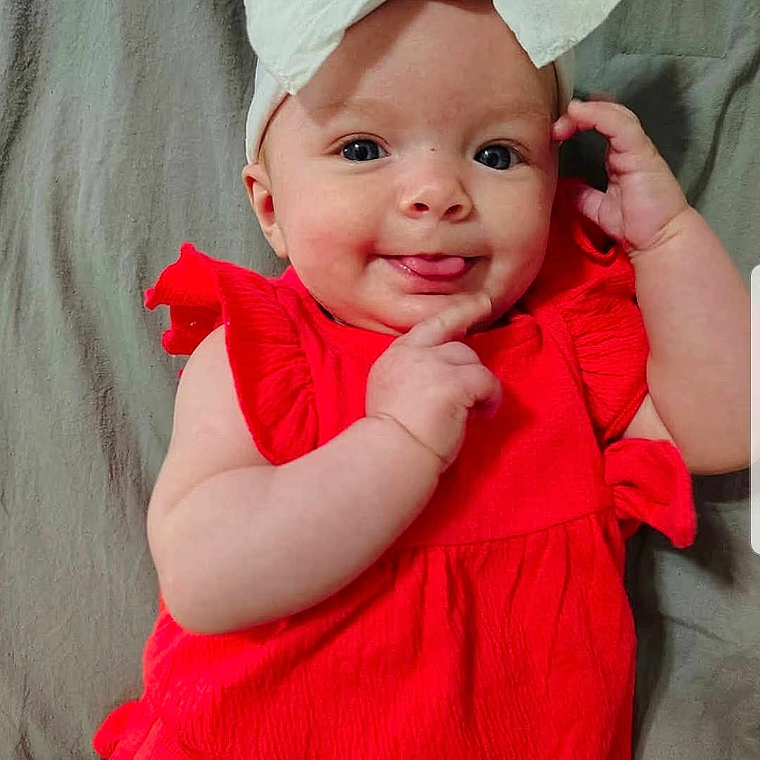 Brylee Grace joined the competition — help win amazing prizes! accessories, baby, babylaughing, bodypart, clothing, dress, face, finger, hand, happy, hat, head, homedecor, newborn, person, photography, portrait, sitting, sleeve, smile
