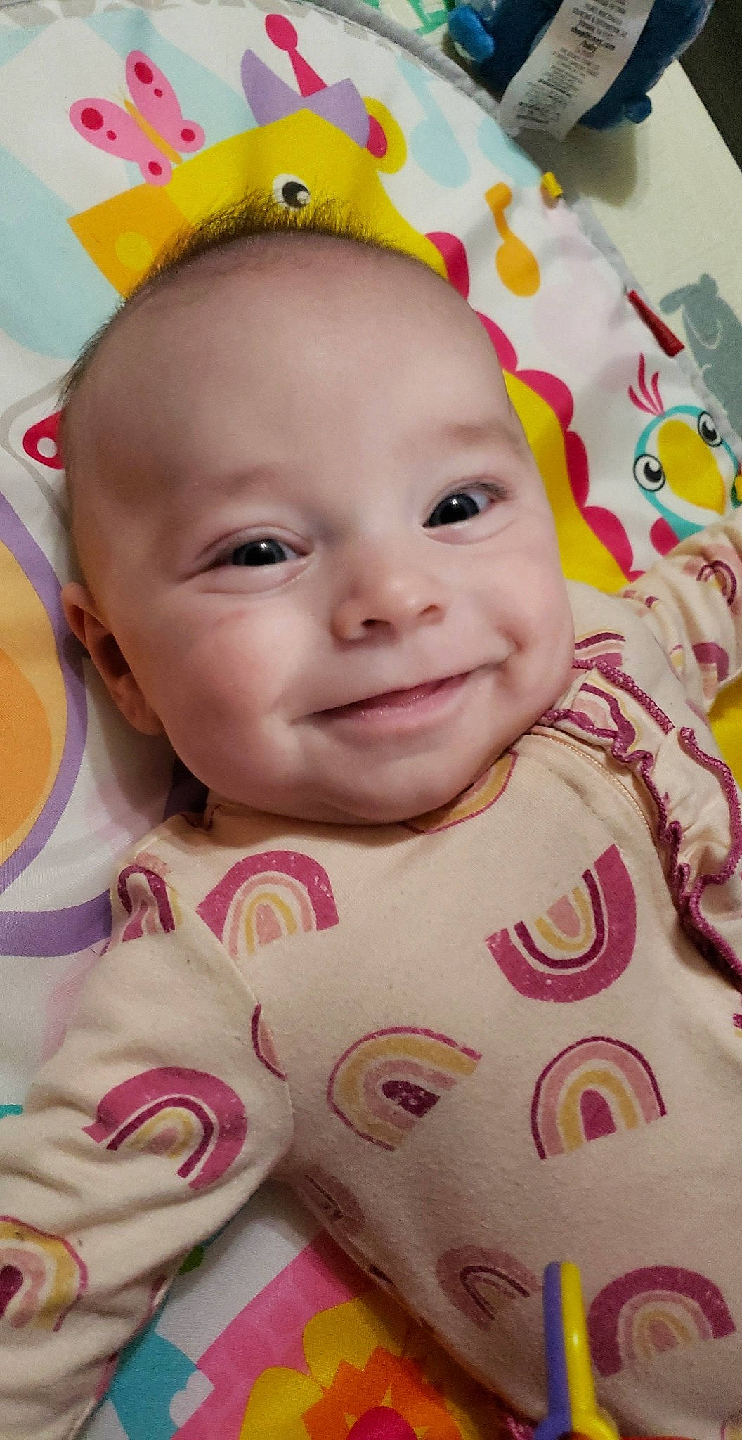 Jocelyn is registered to the contest to win money with this photo: baby, baby_toddler_clothing, cheek, chin, eyebrow, face, facial_expression, happy, head, iris, joy, lip, mouth, nose, person, pink, product, skin, smile, textile