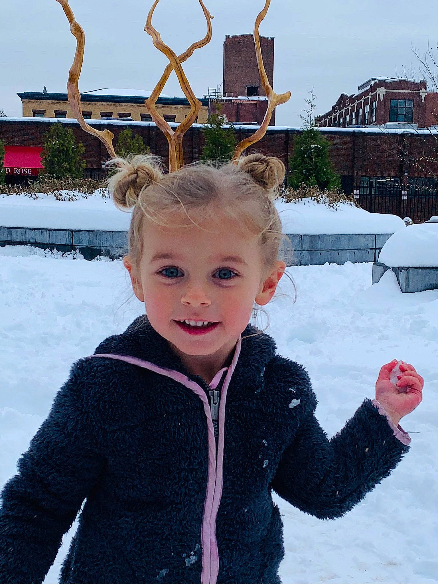 Scarlette is registered to the contest to win money with this photo: baby_toddler_clothing, blond, cheek, child, child_model, freezing, frost, fur, happy, hood, ice, jacket, laugh, person, playing_in_the_snow, precipitation, public_space, snow, toddler, winter