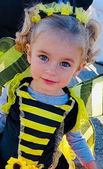 Scarlette is registered to the contest to win money with this photo: baby, baby_products, baby_toddler_clothing, child, ear, fashion_accessory, forehead, hair, hair_accessory, hairstyle, head, headband, headgear, headpiece, iris, mammal, nose, person, skin, toddler