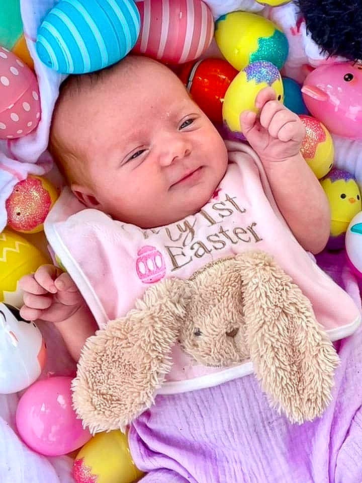 Kallie is registered to the contest to win money with this photo: baby, baby_playing_with_toys, baby_toddler_clothing, cheek, child, facial_expression, finger, fun, happy, organ, person, photograph, pink, product, skin, smile, textile, toddler, toy, white