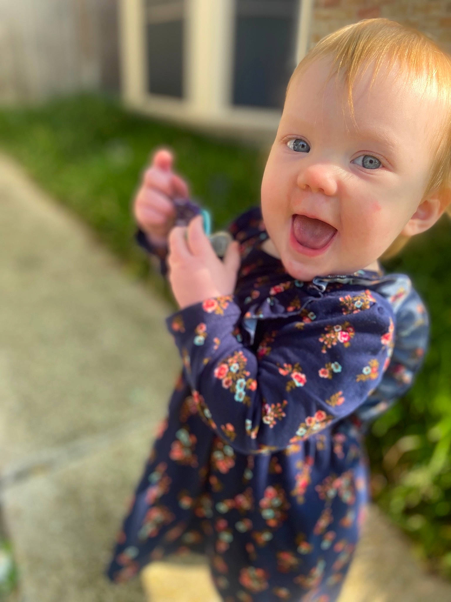 Lynleigh joined the competition — help win amazing prizes! baby, baby_toddler_clothing, cheek, child, finger, fun, gesture, grass, hand, happy, iris, leaf, nose, person, shoulder, skin, sleeve, smile, thumb, toddler