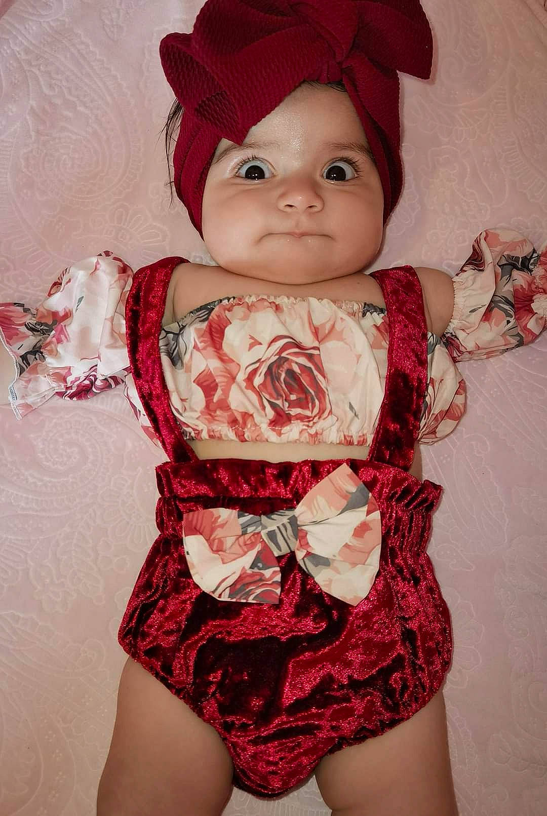 Stella joined the competition — help win amazing prizes! baby_toddler_clothing, cap, day_dress, doll, dress, eyelash, fashion_design, headwear, human_body, human_leg, lip, neck, one_piece_garment, pattern, person, pink, red, sleeve, thigh, toy