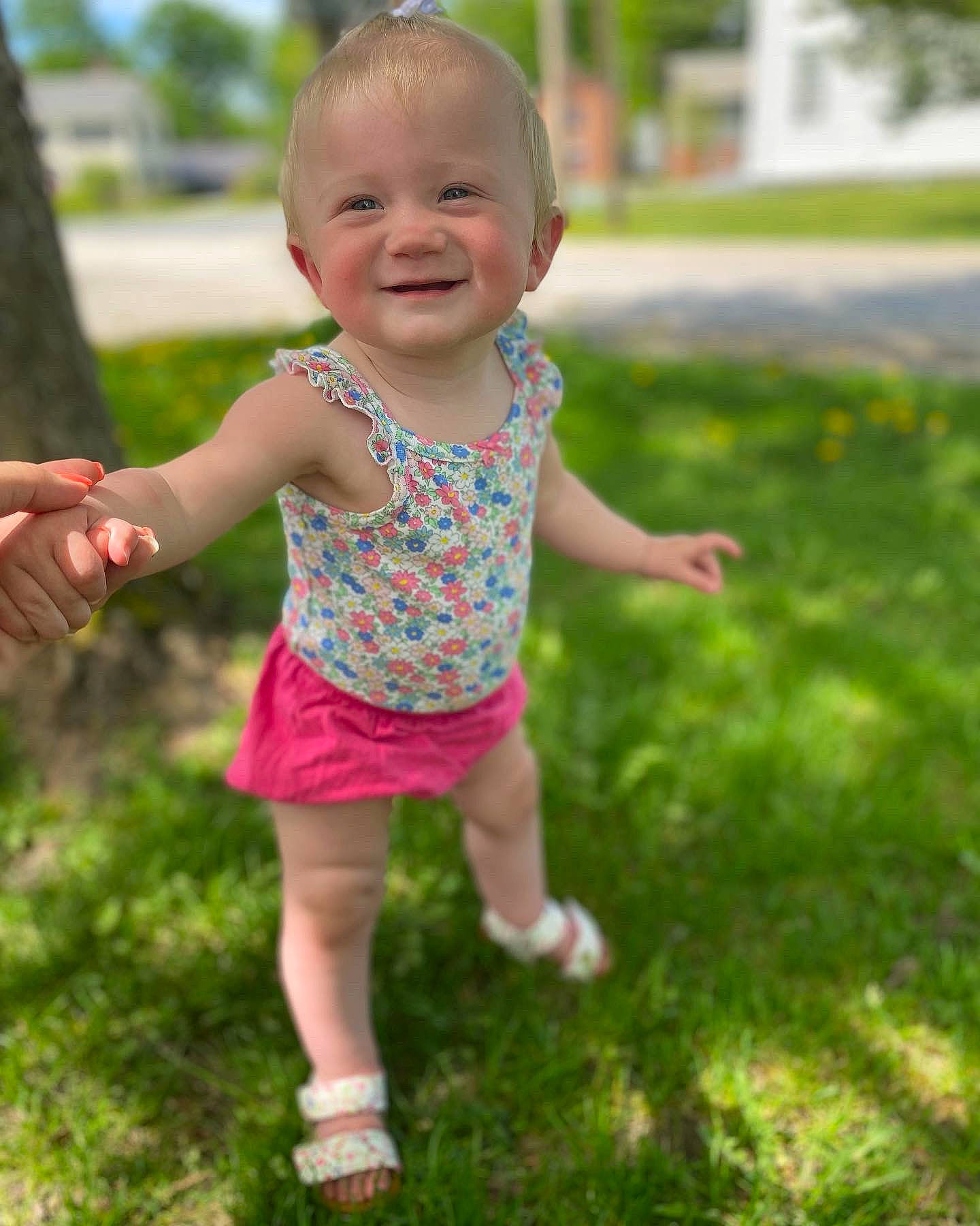 Rylynn joined the competition — help win amazing prizes! baby, baby_toddler_clothing, botany, child, finger, fun, gesture, grass, grass_family, hand, happy, joy, lawn, leisure, meadow, people_in_nature, person, plant, recreation, smile