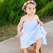 Anna Liz Falcon joined the competition — help win amazing prizes! barefoot, casual, child, curious, cute, dress, flower_crown, girl, greenery, headband, nature, outdoor, person, portrait, side_view, sitting, stool, summer, toddler, young